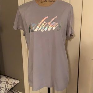a gray adidas tee